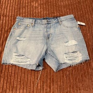 Light wash ripped cut offs